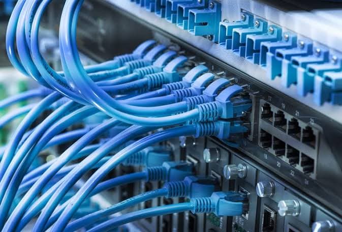 Organized structured cabling in a network rack